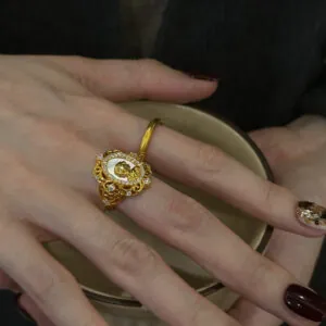 Vintage court open ring in luxury golden brass jewelry.